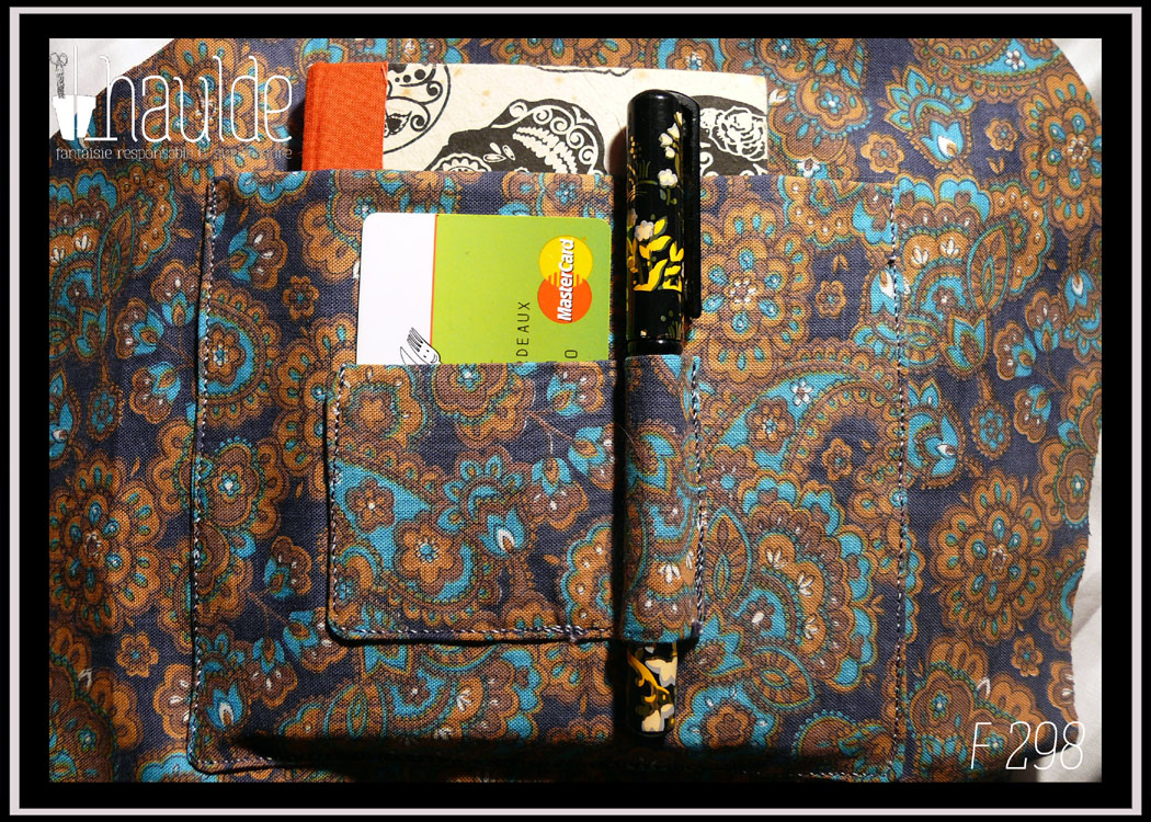 poche intérieure avec pochette à ticket ou CB et boucle pour stylo, vues remplies